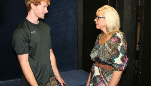Mrs. Riley talks to a young stud